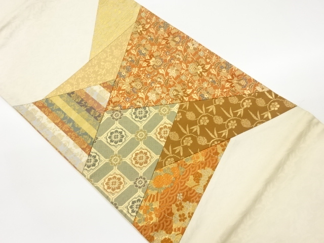 切り嵌め花唐草に笹蔓緞子模様織出し袋帯